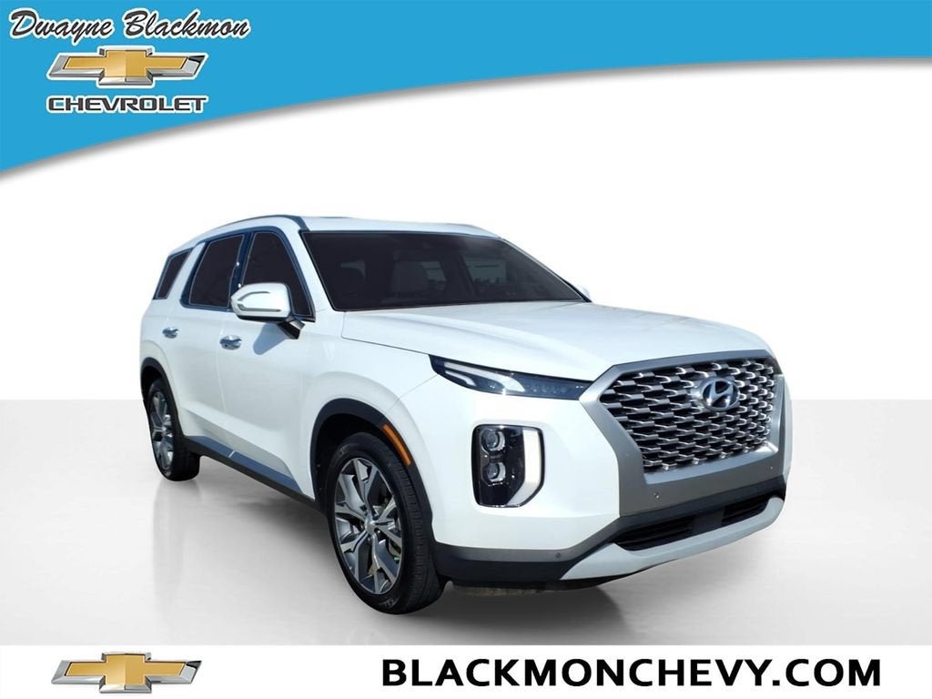 2022 Hyundai Palisade SEL in Polar White Tricoat — front three-quarter view